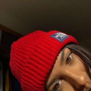 Red north face beanie